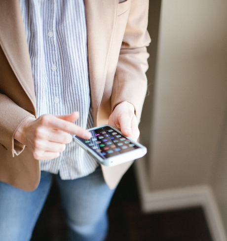 Close up of individual accessing their smart phone