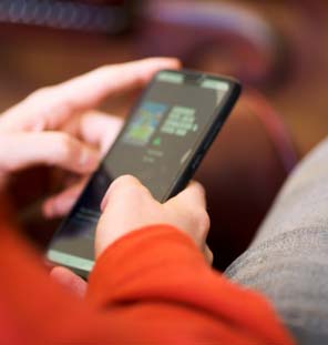 close up image of hand holding phone
