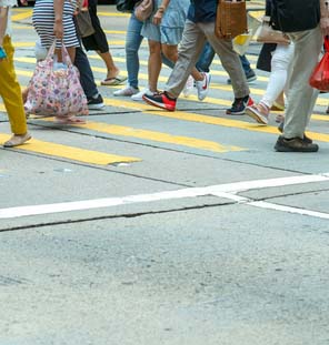 View of people walking on crosswalk 