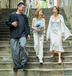 group of people walking down the steps