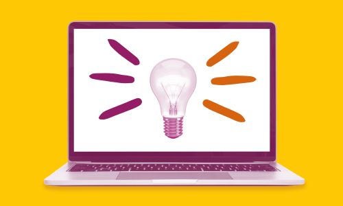A laptop that's opened and an image of a light bulb on the screen.